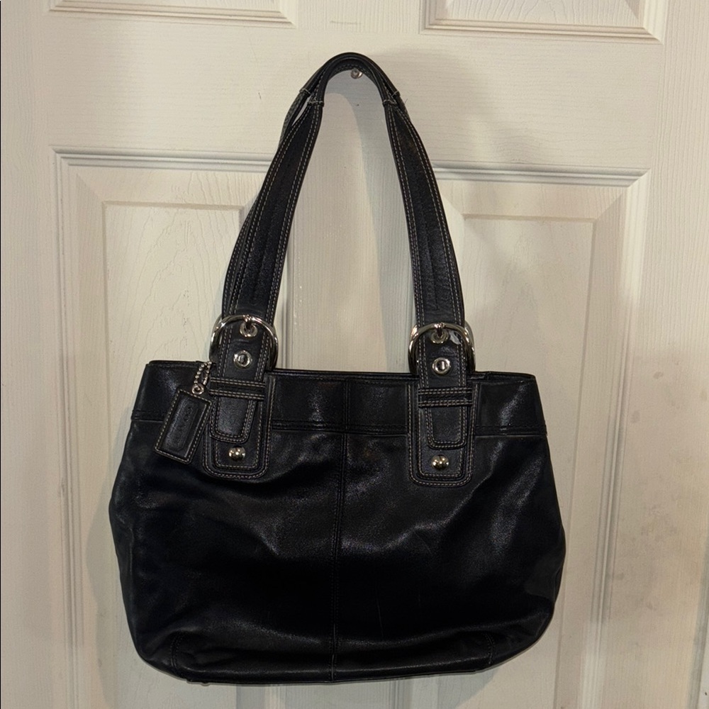 Black Leather Shoulder Bag with Structured Design.